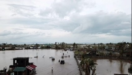 Villages underwater after typhoon strikes Philippines