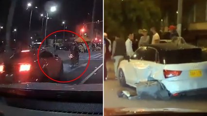 Así fue el momento en que conductor de carro de alta gama atropella un motociclista y luego huye
