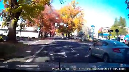 Truck with Trump Flag Runs Red Light