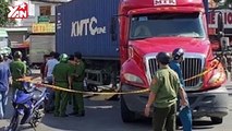 XE CONTAINER TÔNG NHIỀU PHƯƠNG TIỆN ĐANG CHỜ ĐÈN ĐÒ