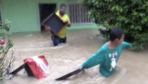 Families evacuate flooded homes amid Eta flooding