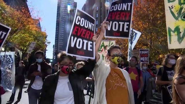 US presidential election 2020: Trump and Biden supporters in tense face off in Philadelphia