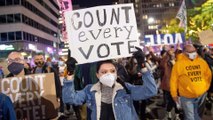 Trump calls election a 'fraud' and Biden awaits full vote count as frustrated Americans protest