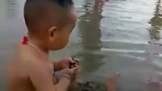 Cute and Funny Baby Playing on the Beach