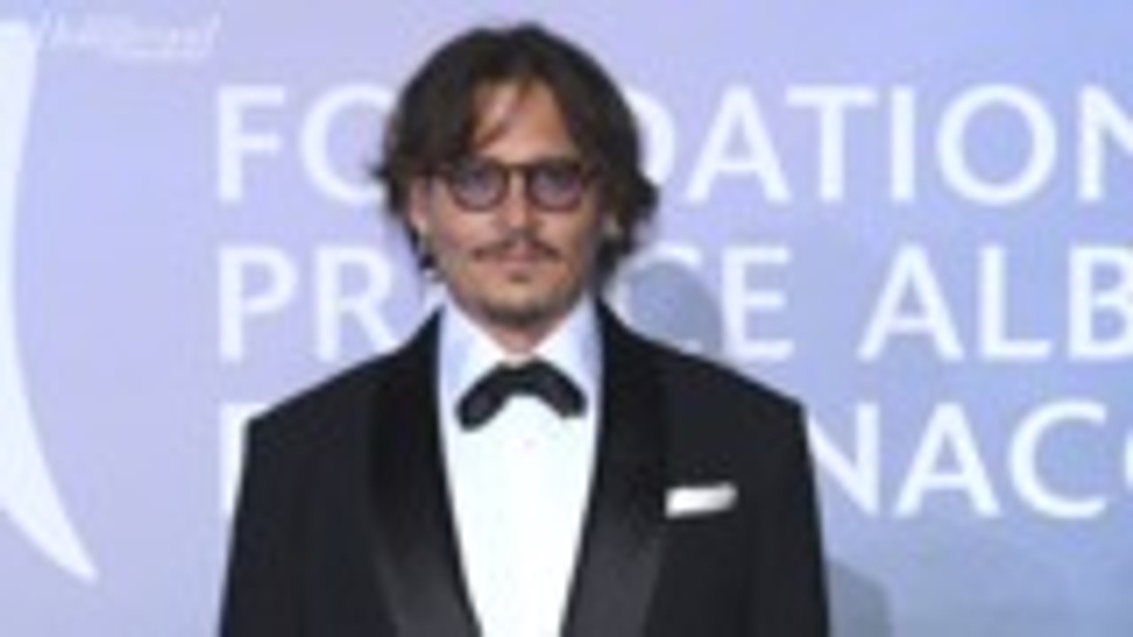 Warner Bros. Forces Johnny Depp to Resign From...