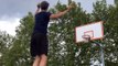 Guy Throws One Basketball in Basket While Standing Over Other and Makes Two Shots in Row