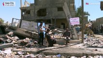 Palestinian barber resumes work amid ruins of destroyed Gaza shop