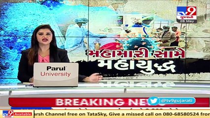 COVID-19_ Long queue for drive through vaccination at GMDC, Ahmedabad _ TV9News