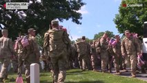 US soldiers place flags at Arlington National Cemetery ahead of Memorial Day