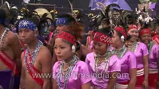 Naga tribes' men and women in traditional colourful headgear!