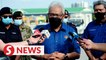 Vehicles on roads drop by 70% on first day of total lockdown, says Hamzah