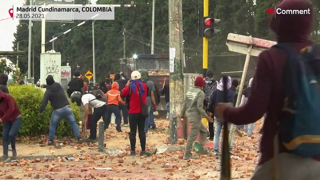Police and protesters clash as Colombia's Duque deploys military