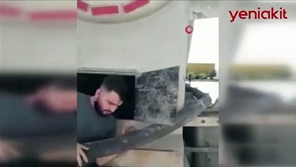 Çimento yüklü kamyonun gizli bölmesinde yakalandılar!