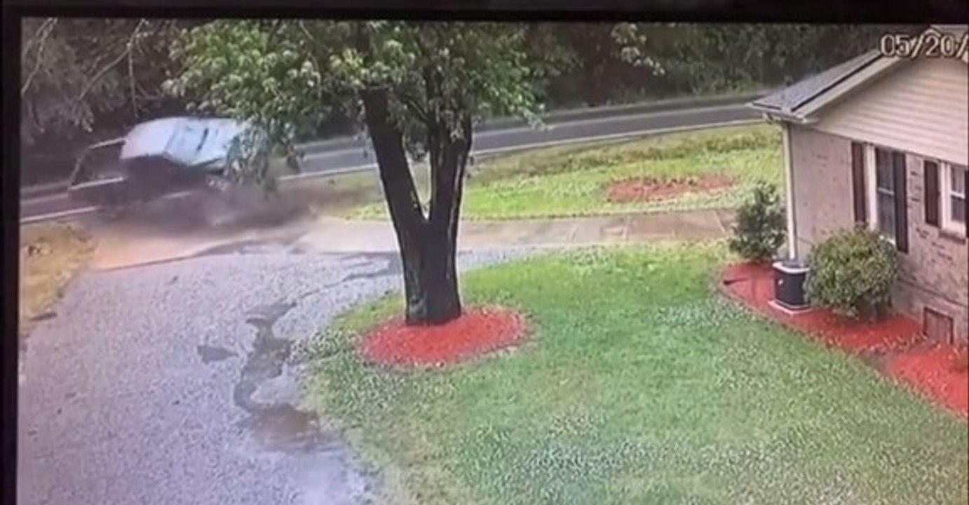 Truck Skids And Bounces Off Slippery Road While Driving After Storm