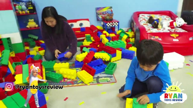 Ryan builds the tallest giant Lego tower challenge vs mommy! Ryan's World