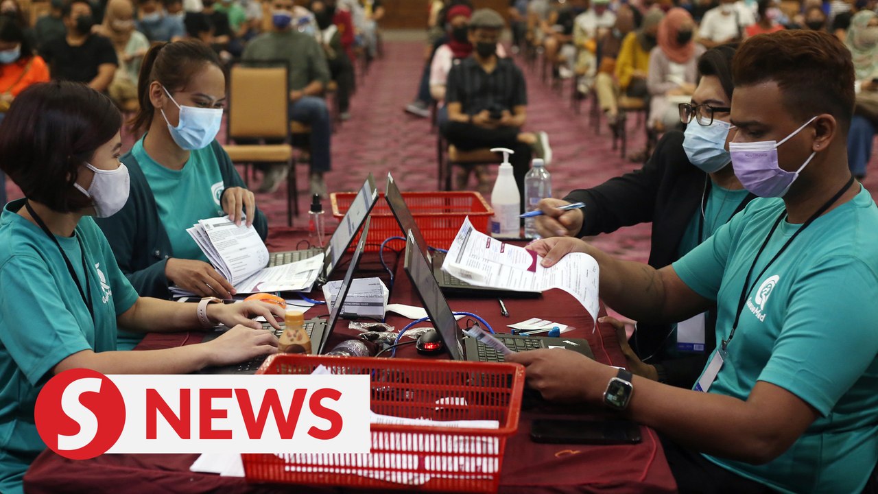 Former flight crew among those who take on new roles as staff at Shah Alam vaccination centre