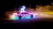Race Car Decorated With LED Lights for Christmas Does Donuts on Street