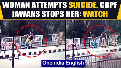 Скачать видео: Srinagar: Woman tries to jump off the bridge but CRPF jawan prevents her| J&K| Oneindia News