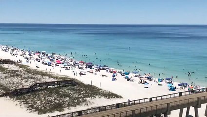 Across the nation, people mark the unofficial start of summer at the beach