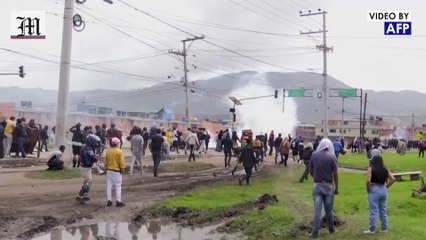Police fire tear gas at protesters in Facatativa, Colombia