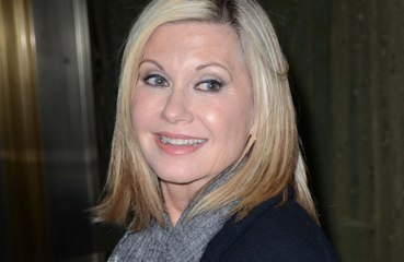 Olivia Newton-John says John Travolta is 'doing as well as can be expected'