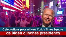 Celebrations pour in at New York’s Times Square as Biden clinches presidency