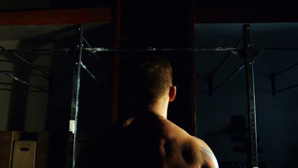 athlete-doing-exercise-in-the-bars