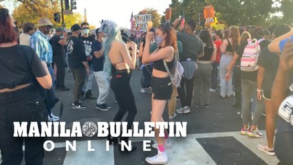 Americans dance near White House to celebrate Biden's victory