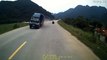 Truck Loses Tire on Curving Road