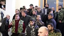 Armenian protesters storm government building after peace deal announced