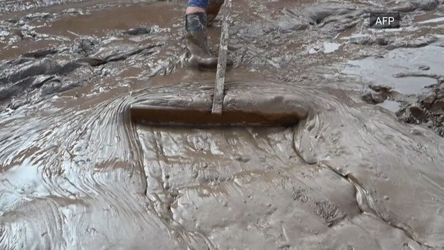 Mud and debris removed as cleanup from Eta continues