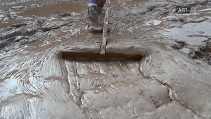 Mud and debris removed as cleanup from Eta continues