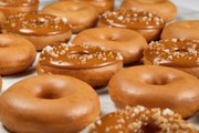 Krispy Kreme Unveils Caramel Glazed and Salted Double Caramel Crunch Doughnuts for a Limit