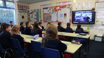 Last Post played in Jersey is watched on Zoom by Tarleton Community Primary School pupils