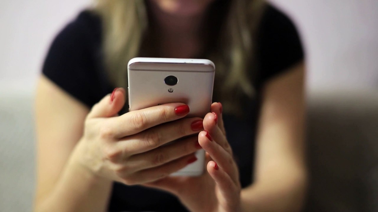 Woman Is Working With Her Mobile