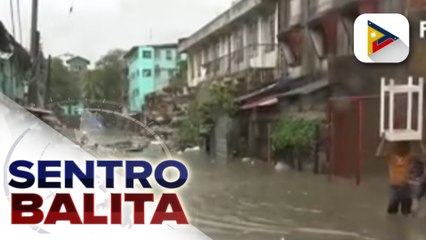 Rescue ops sa mga na-trap na pamilya sa Malabon City, patuloy