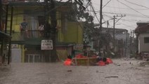 Residents rescued as typhoon floods city