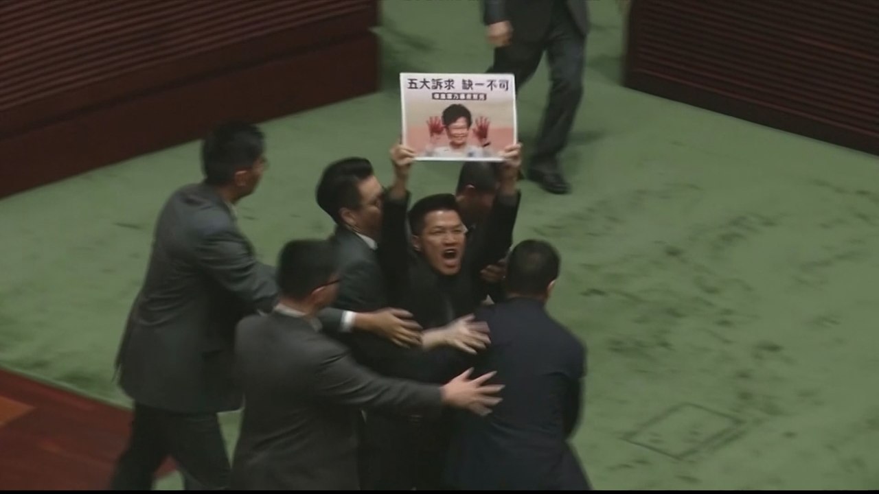 China defends rule that led to Hong Kong politicians' dismissal