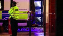 British police detain man after car crashes into police station