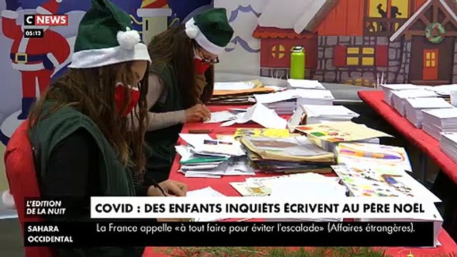Reportage au service du courrier du Père Noël de la Poste avec des lettres d'enfants inquiets par la propagation du virus et le confinement