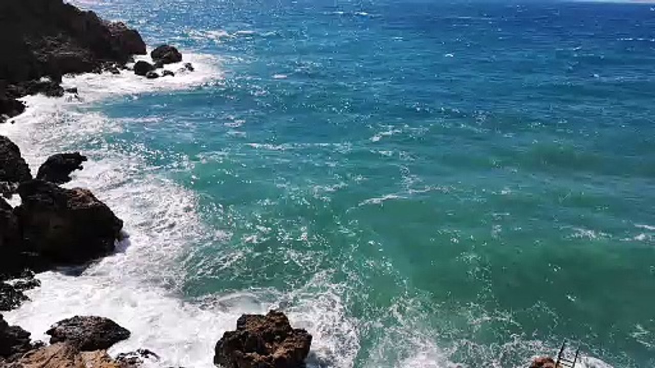 Rocksview-of-a-beautiful-beach-full-of-rocks natural beautiful royalty Free Stock no copyright video Free for commercial use dron dron aerial view