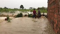 Residents flee flooding in Colombia