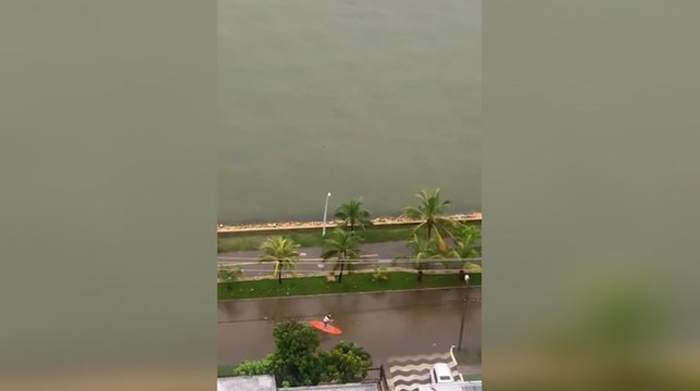 Paddleboarding the flooded streets of Colombia during Iota