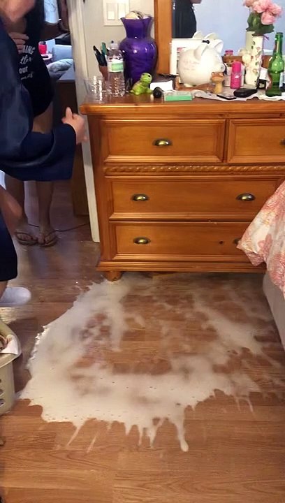 Champagne Spills After Cork Popping Surprise