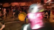 Protesters clash with police in Peru's largest demonstration in decades