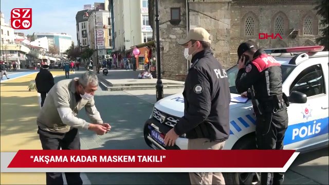 Maskesini takmadı, kendisine ceza kesen polisle tartıştı