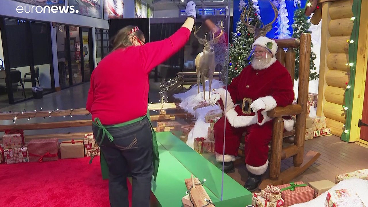 USA: Weihnachtsmann hinter Plexiglas