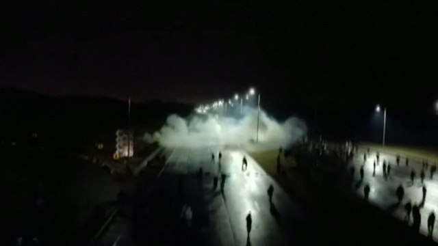 Hardline Islamic group supporters clash with Pakistani police during latest anti-France protests