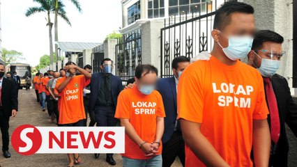 Border stamp forgery: 13 suspects remanded, including nine Immigration Dept personnel