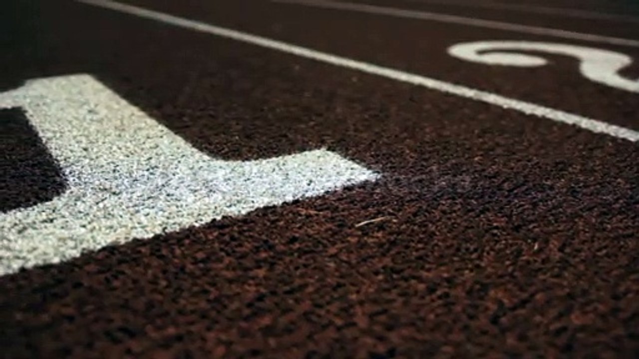 slow-dolly-of-a-number-1-on-a-running-track_eyfv1pto__9206c83df21697cb984dbfc28a839e33__P1080